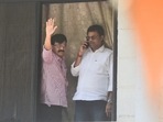 Shiv Sena leader Sanjay Raut waves at supporters as Enforcement Directorate officials conduct searches at his Mumbai residence. (Photo by Satish Bate) Shiv Sena leader Sanjay Raut waves at supporters as Enforcement Directorate officials conduct searches at his Mumbai residence. (Photo by Satish Bate)