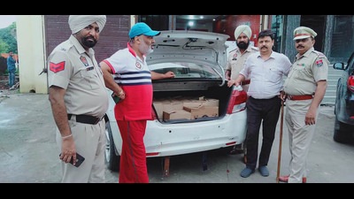 A car from which illicit liquor was seized in Ludhiana on Sunday. (HT)