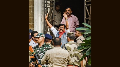 Shiv Sena MP Sanjay Raut being taken to the Enforcement Directorate (ED) office in Mumbai on Sunday. (PTI) Shiv Sena MP Sanjay Raut being taken to the Enforcement Directorate (ED) office in Mumbai on Sunday. (PTI)
