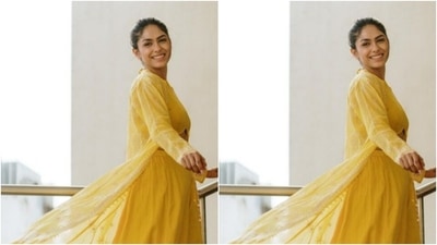 Styled by hairstylist Deepali Dilip Deokar, Mrunal wore her tresses into a messy bun and left a few strands of hair open to give a more ethnic feel to her look. (Instagram/@mrunalthakur)