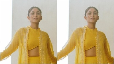 Assisted by fashion stylist Archa Mehta, Mrunal opted for a minimal makeup look to complement her attire for the day. In nude eyeshadow, black kohl, mascara-laden eyelashes, contoured cheeks and a shade of nude lipstick, she looked fashion-ready. (Instagram/@mrunalthakur)