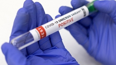 FILE PHOTO: Test tube labelled "COVID-19 Omicron variant test positive" is seen in this illustration picture taken January 15, 2022. REUTERS/Dado Ruvic/Illustration/File Photo (REUTERS)