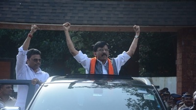 Shiv Sena MP Sanjay Raut while being taken from his house to the ED office in Mumbai. (Praful Gangurde/HT photo) Shiv Sena MP Sanjay Raut while being taken from his house to the ED office in Mumbai. (Praful Gangurde/HT photo)