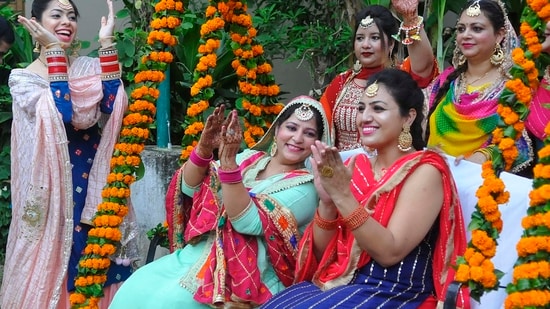 Hariyali Teej also known as Shraavana Teej is a festival of the Hindus dedicated to Goddess Parvati and her union with Lord Shiva. It is observed in the northern states of Punjab, Haryana, Rajasthan and Chandigarh. This year, the festival will be celebrated on July 31.(HT Photo/Keshav Singh)
