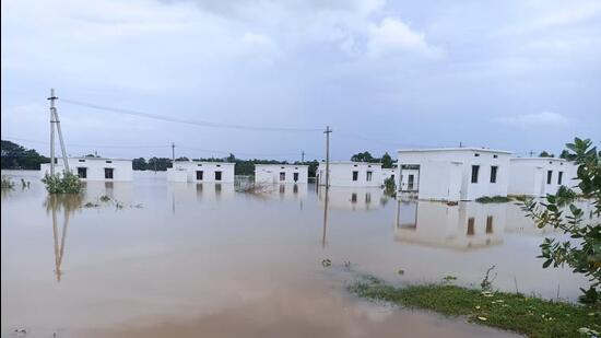 Polavaram rehabilitation colony at Kivvaka sumberged under water. (HT Photo)