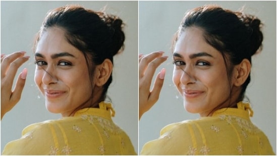 Mrunal played muse to fashion designer House of Kotwara and picked a bright yellow attire for the pictures.(Instagram/@mrunalthakur)