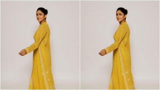 Mrunal posed against a white backdrop and served fresh ethnic fashion inspo for her fans as she slayed the look to perfection.(Instagram/@mrunalthakur)
