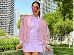 Sunny Leone slays monsoon fashion goals in a white dress, pink jacket