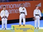 Shushila Devi Likmabam with her silver medal at the podium.(Twitter/@WeAreTeamIndia)