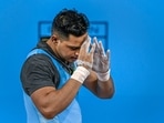 Commonwealth Games 2022: India's Ajay Singh reacts after an unsuccessful attempt during the men's 81kg category weightlifting event. Commonwealth Games 2022: India's Ajay Singh reacts after an unsuccessful attempt during the men's 81kg category weightlifting event.