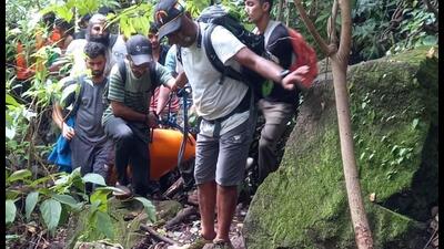 Supriya Gavne, a trekker from Pune, was rescued by the Shivdurg team after she fractured her leg at Kataldhar waterfall near Lonavla on Sunday. (HT)