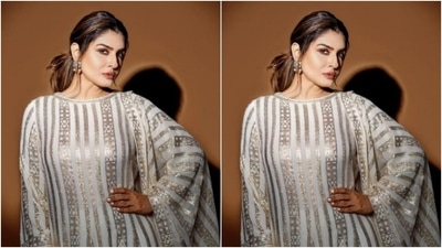 Raveena teamed it with a pair of trousers with wide legs, featuring the same print. In a white and golden dupatta, Raveena completed her look. (Instagram/@officialraveenatandon)