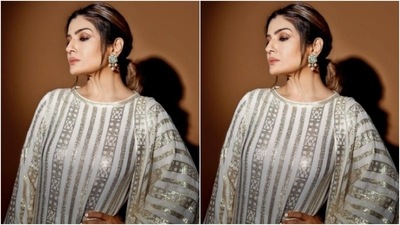 Assisted by makeup artist Shura Bhavin, Raveena decked up in maroon eyeshadow, black eyeliner, black kohl, mascara-laden eyelashes, drawn eyebrows, contoured cheeks and a shade of nude lipstick. (Instagram/@officialraveenatandon)