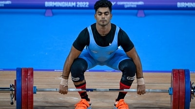 India's Achinta Sheuli in action during the men's 73kg weightlifting category match of the Commonwealth Games 2022 (CWG), in Birmingham. (PTI) India's Achinta Sheuli in action during the men's 73kg weightlifting category match of the Commonwealth Games 2022 (CWG), in Birmingham. (PTI)