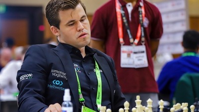 Magnus Carlsen's Norway was held to a draw in the Chess Olympiad. Magnus Carlsen's Norway was held to a draw in the Chess Olympiad.