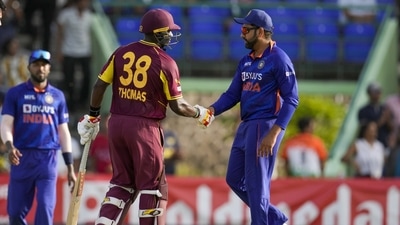 Devon Thomas shakes hands with Rohit Sharma at the end of their second T20I (AP) Devon Thomas shakes hands with Rohit Sharma at the end of their second T20I (AP)