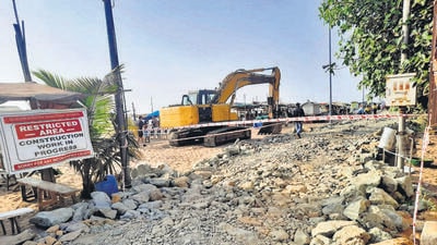 An anti erosion wall being constructed by Maharashtra Maritime Board (MMB) at Aksa beach. (HT Photo) An anti erosion wall being constructed by Maharashtra Maritime Board (MMB) at Aksa beach. (HT Photo)