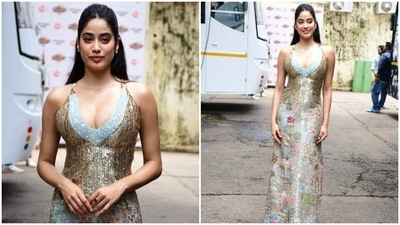 Janhvi's multi-hued gown also features a plunging V neckline and back, sequinned embellishments done all over, floral thread embroidery, floor-grazing hem length, a fitted bodice, and double halter straps. (HT Photo/Varinder Chawla) Janhvi's multi-hued gown also features a plunging V neckline and back, sequinned embellishments done all over, floral thread embroidery, floor-grazing hem length, a fitted bodice, and double halter straps. (HT Photo/Varinder Chawla)