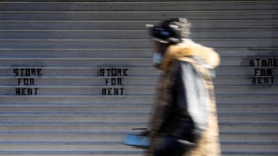 A person walks through the Manhattan borough of New York City. (REUTERS)