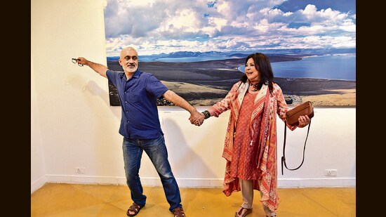 Milan Moudgill has a fun moment, with fashion designer Ritu Kumar, at the opening of his debut exhibition. (Photo: Manish Rajput/HT)