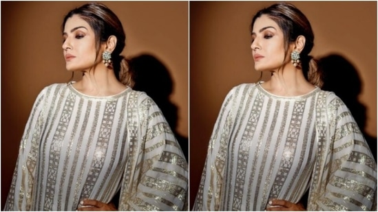 Assisted by makeup artist Shura Bhavin, Raveena decked up in maroon eyeshadow, black eyeliner, black kohl, mascara-laden eyelashes, drawn eyebrows, contoured cheeks and a shade of nude lipstick.(Instagram/@officialraveenatandon)