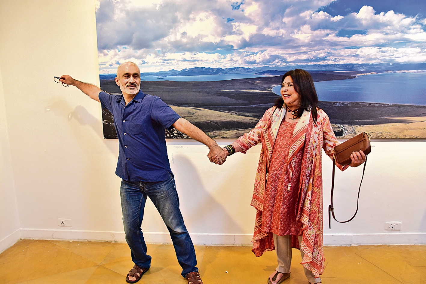 Milan Moudgill has a fun moment, with fashion designer Ritu Kumar, at the opening of his debut exhibition. (Photo: Manish Rajput/HT) Milan Moudgill has a fun moment, with fashion designer Ritu Kumar, at the opening of his debut exhibition. (Photo: Manish Rajput/HT)