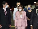 US House Speaker Nancy Pelosi (centre) arrives in Taipei, Taiwan, on Tuesday. (AP) US House Speaker Nancy Pelosi (centre) arrives in Taipei, Taiwan, on Tuesday. (AP)