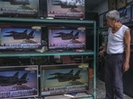 Televisions broadcast news reports on US Air Force in Taipei, Taiwan, on Tuesday. Televisions broadcast news reports on US Air Force in Taipei, Taiwan, on Tuesday. 