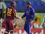 Rohit Sharma (R) with Devon Thomas Rohit Sharma (R) with Devon Thomas