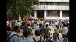Media personnel gather outside the Herald House amid ED raids in the National Herald money laundering case, in New Delhi on Tuesday. (ANI) Media personnel gather outside the Herald House amid ED raids in the National Herald money laundering case, in New Delhi on Tuesday. (ANI)