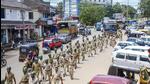 Puttur: Police personnel conduct a march past in Puttur, Mangaluru, Thursday, July 28, 2022. Tension prevailed in Puttur and other talukas of Dakshina Kannada district following the murder of Bharatiya Janata Yuva Morcha (BJYM) member Praveen, who was hacked to death on Tuesday evening, July 26, by unidentified people on a bike. (PTI) Puttur: Police personnel conduct a march past in Puttur, Mangaluru, Thursday, July 28, 2022. Tension prevailed in Puttur and other talukas of Dakshina Kannada district following the murder of Bharatiya Janata Yuva Morcha (BJYM) member Praveen, who was hacked to death on Tuesday evening, July 26, by unidentified people on a bike. (PTI)