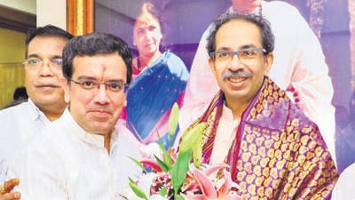 Kedar Dighe (left) with Uddhav Thackeray Twitter Kedar Dighe (left) with Uddhav Thackeray Twitter