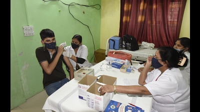 A beneficiary getting inoculated with a dose of Covid-19 vaccine. (File photo)