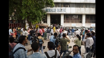 Media personnel gather outside the Herald House amid ED raids in the National Herald money laundering case, in New Delhi on Tuesday. (ANI) Media personnel gather outside the Herald House amid ED raids in the National Herald money laundering case, in New Delhi on Tuesday. (ANI)