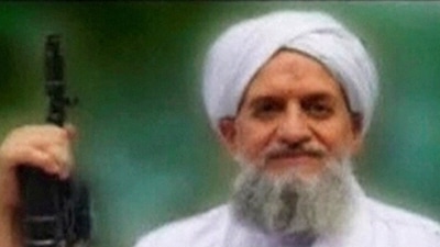 FILE PHOTO: A photo of Al Qaeda's &nbsp;leader, Egyptian Ayman al-Zawahiri, is seen in this still image taken from a video released on September 12, 2011. SITE Monitoring Service/Handout via REUTERS TV.&nbsp; (via REUTERS)