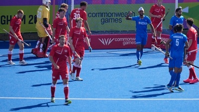 India's Mandeep Singh, centre, raises his arm as he celebrates after scoring a goal during pool B hockey match between India and England at the Commonwealth Games in Birmingham, England (AP) India's Mandeep Singh, centre, raises his arm as he celebrates after scoring a goal during pool B hockey match between India and England at the Commonwealth Games in Birmingham, England (AP)