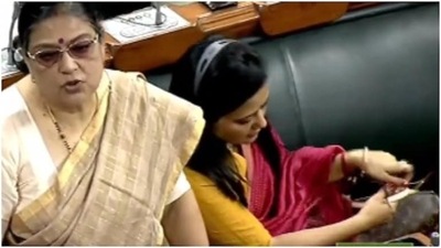 TMC leader Mahua Moitra could be seen keeping her bag beneath the table. TMC leader Mahua Moitra could be seen keeping her bag beneath the table.