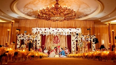 Groom's nose pulling: This is a famous Gujarati wedding custom where the bride's mother gives all the royal treatment to the groom by welcoming him with aarti, tilak and sweets and gently pulling his nose as a funny way of telling the groom to be humble as he comes to his to-be wife's house. (Unsplash) Groom's nose pulling: This is a famous Gujarati wedding custom where the bride's mother gives all the royal treatment to the groom by welcoming him with aarti, tilak and sweets and gently pulling his nose as a funny way of telling the groom to be humble as he comes to his to-be wife's house. (Unsplash)