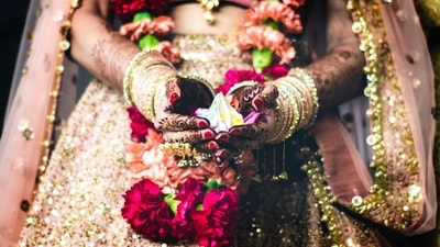 Bride and groom's mothers are not invited to the wedding: According to Bengali tradition, the presence of their mothers during the wedding ceremony is considered 'inauspicious' because of the emotional attachment of mothers towards their children that is linked to the mother's evil eyes. The present generation considers this custom 'regressive.' (Unsplash) Bride and groom's mothers are not invited to the wedding: According to Bengali tradition, the presence of their mothers during the wedding ceremony is considered 'inauspicious' because of the emotional attachment of mothers towards their children that is linked to the mother's evil eyes. The present generation considers this custom 'regressive.' (Unsplash)