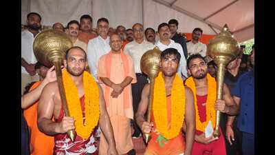 U.P. chief minister Yogi Adityanath felicitated the winners of a wrestling championship organised on Goraknath temple premises in Gorakhpur on Tuesday. (Amiruddin Guddu/HT) U.P. chief minister Yogi Adityanath felicitated the winners of a wrestling championship organised on Goraknath temple premises in Gorakhpur on Tuesday. (Amiruddin Guddu/HT)
