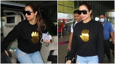 Malaika Arora is the boss lady of airport fashion in sweatshirt, distressed jeans and bare face (HT Photo/Varinder Chawla) Malaika Arora is the boss lady of airport fashion in sweatshirt, distressed jeans and bare face (HT Photo/Varinder Chawla)