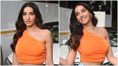 Nora Fatehi's formula of dishing back-to-back incredible sartorial appearances is all about dressing according to her mood and comfort. The star rarely goes wrong with any fashion statement and loves experimenting with her wardrobe. However, even her casual sartorial moments are nothing less than stunning. Proof? Nora's latest appearance was in Mumbai, dressed in an orange one-shoulder crop top and light blue joggers. Check out her photos below. (HT Photo/Varinder Chawla) Nora Fatehi's formula of dishing back-to-back incredible sartorial appearances is all about dressing according to her mood and comfort. The star rarely goes wrong with any fashion statement and loves experimenting with her wardrobe. However, even her casual sartorial moments are nothing less than stunning. Proof? Nora's latest appearance was in Mumbai, dressed in an orange one-shoulder crop top and light blue joggers. Check out her photos below. (HT Photo/Varinder Chawla)