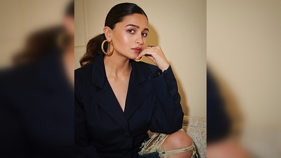 Alia Bhatt tied a mid-high sleek ponytail with the ends curled into soft beach waves.(Instagram/@aliaabhatt)