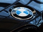 BMW expects a solid sales increase in the second half but said total deliveries will fall short of last year's record highs of 2.52 million across the group.