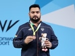 Weightlifter Lovepreet Singh poses for a photo after winning the bronze medal in men's weightlifting 109 Kg at the Commonwealth Games 2022(Team India Twitter)