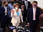 U.S. House of Representatives Speaker Nancy Pelosi walks next to Legislative Yuan Vice President Tsai Chi-chang as she leaves the parliament in Taipei.