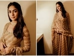 The young and versatile actor Mrunal Thakur has lured the fashion gurus with her impeccable style sense. She is an avid social media user who keeps her fans updated with all her doings. She can ace any look effortlessly and knows all the spells to leave fans enchanted with her dreamy avatars. She is here to take your mid-week blues in this stunning beige anarkali set.(Instagram/@mrunalthakur)