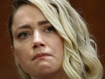 Amber Heard is to pay Johnny Depp $10.35 million for damaging his reputation by describing herself as a domestic abuse victim in an op-ed piece she wrote. (AP)(AP) Amber Heard is to pay Johnny Depp $10.35 million for damaging his reputation by describing herself as a domestic abuse victim in an op-ed piece she wrote. (AP)(AP)