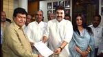 Kuldeep Bishnoi hands over his resignation to Haryana assembly speaker Gyan Chand Gupta as MLA from the Adampur constituency in Haryana, in Chandigarh on Wednesday. Flag-bearer of Bhajan Lal’s legacy, he will formally come under the wings of the BJP on Thursday. (Keshav Singh/HT) Kuldeep Bishnoi hands over his resignation to Haryana assembly speaker Gyan Chand Gupta as MLA from the Adampur constituency in Haryana, in Chandigarh on Wednesday. Flag-bearer of Bhajan Lal’s legacy, he will formally come under the wings of the BJP on Thursday. (Keshav Singh/HT)