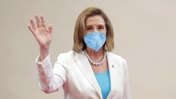 US House Speaker Nancy Pelosi waves during a meeting, in Taipei on Wednesday.&nbsp;